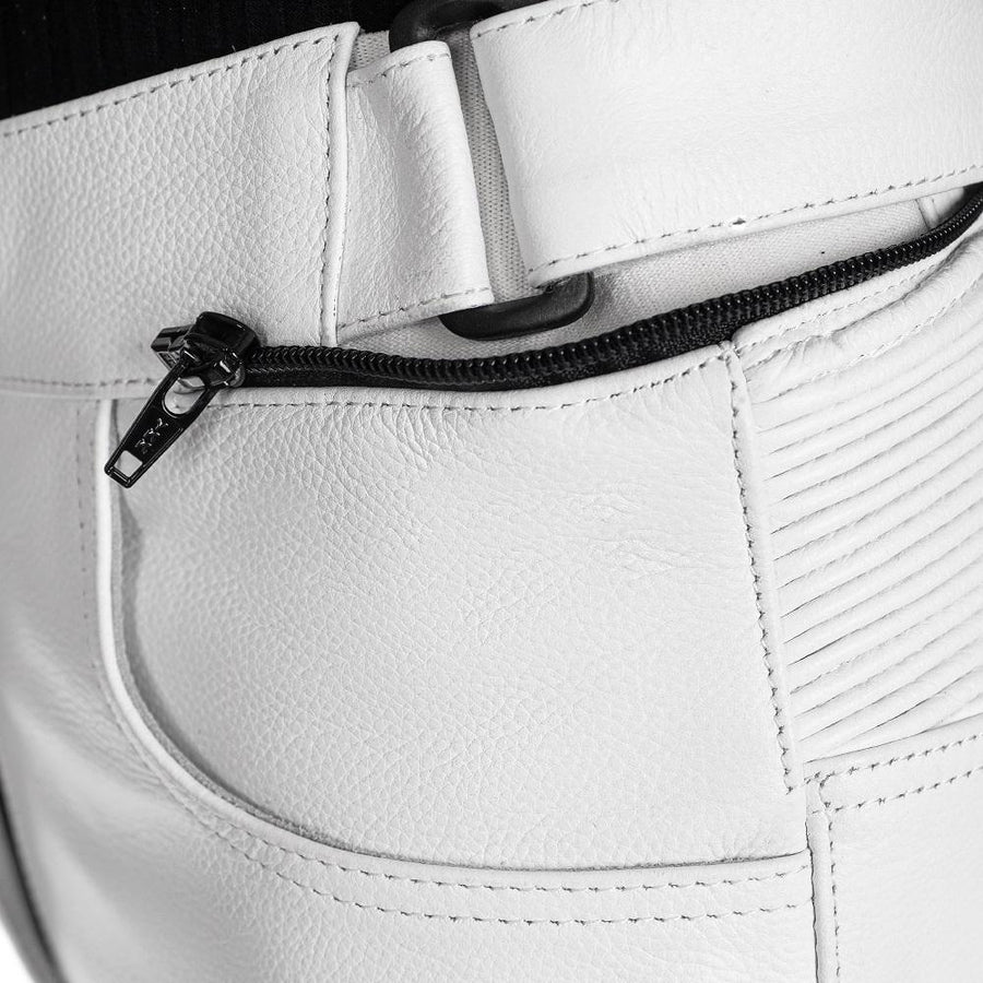 equilibrium white women motorcycle leather pants, genuine cowhide leather, removable ce protectors, kevlar, cordura, YKK zippers, pockets, attachment zipper, close-up photo
